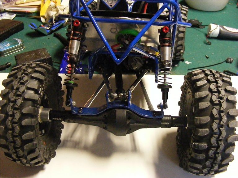 Benefit in moving lower shock mounts further out on axles? RCCrawler