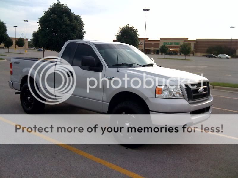 Silver ford f150 with black rims #8